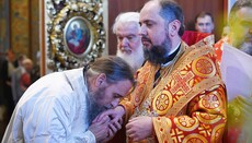 Dumenko calls kissing a priest's hand a "slavish Russian tradition"