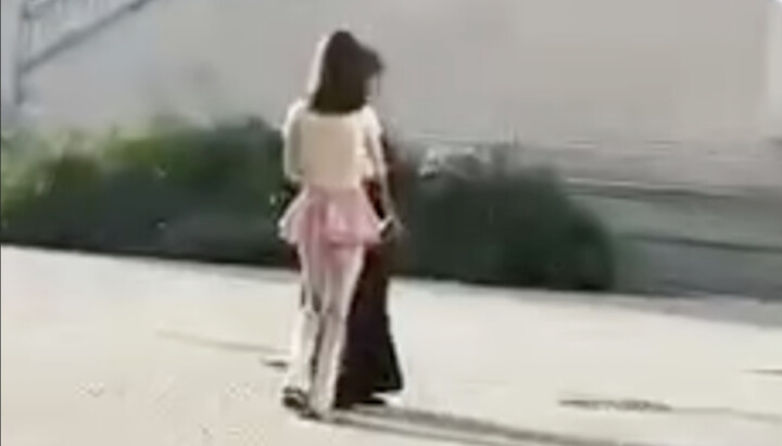 Transgenders at the Sretensky Monastery talking to a priest. Photo: a video screenshot