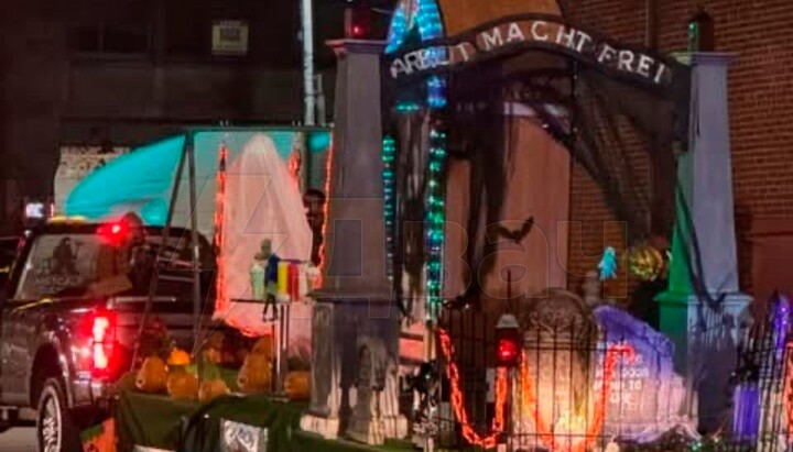 A replica of the Auschwitz entrance gate on a festive float of a Catholic school. Photo: dailymail