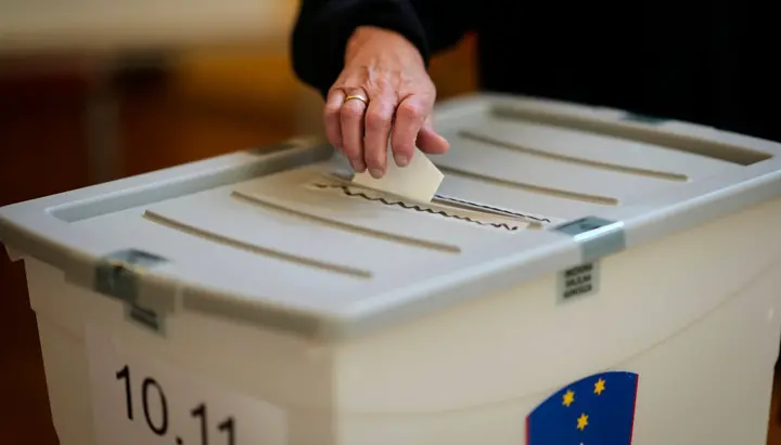 Voting at a polling station during Slovenia’s euthanasia referendum, 23 November 2025. Photo: AP Photo/Darko Bandic