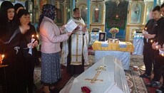 UOC priests hold funeral service for victims of missile strike on Dnipro