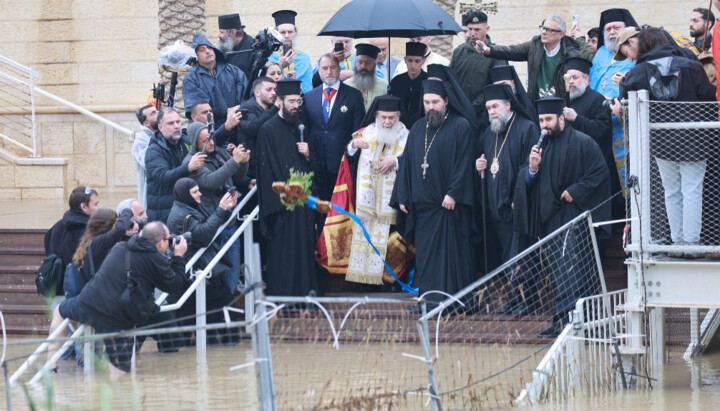 Patriarch Theophilos of Jerusalem blesses the waters of the Jordan River. Photo: Jerusalem Patriarchate