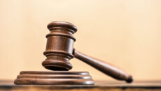Jehovah's Witnesses elder tried for refusing to bear arms
